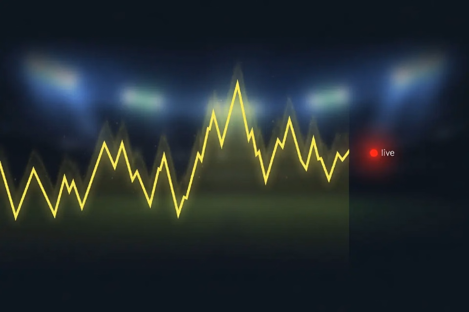 Estadio nocturno con una señal visual de actividad en directo.